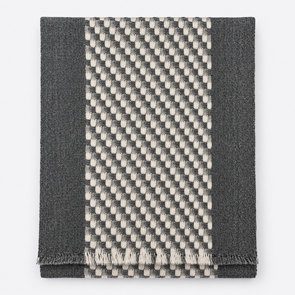 Folded charcoal and cream checkered scarf with fringe