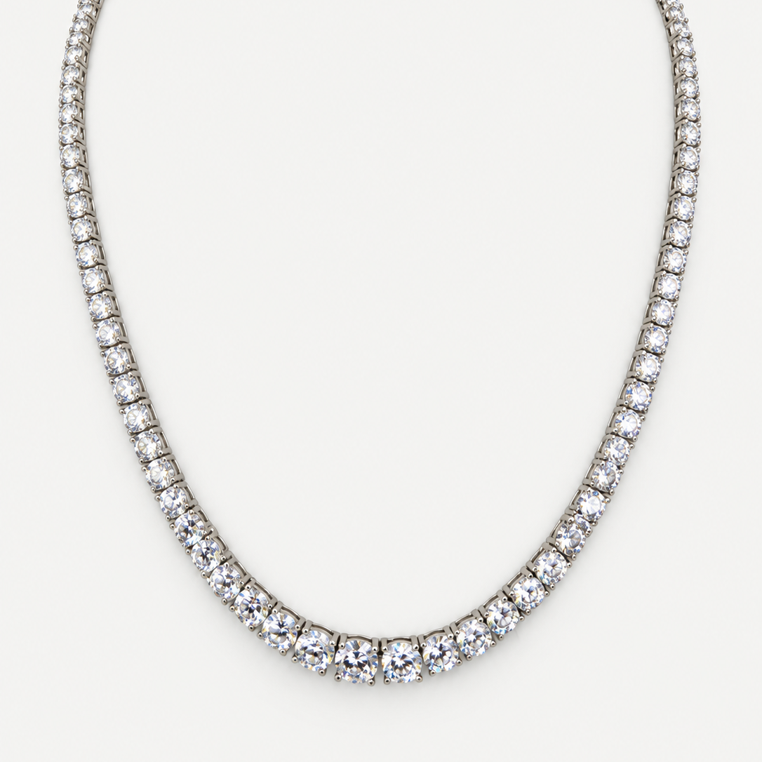 Gradient Tennis Necklace in sterling silver with gradient cubic zirconia on a white background