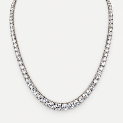 Gradient Tennis Necklace in sterling silver with gradient cubic zirconia on a white background
