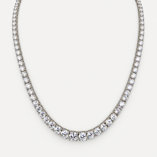 Gradient Tennis Necklace in sterling silver with gradient cubic zirconia on a white background