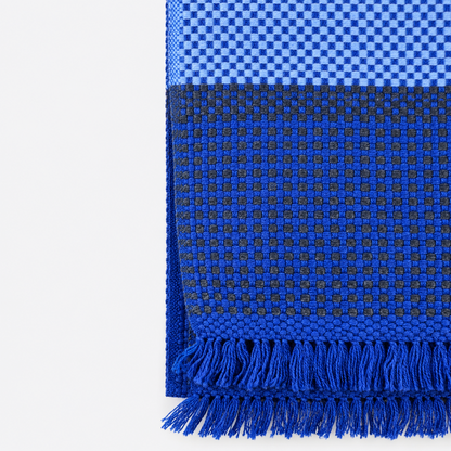 Cobalt blue woven pattern and fringe detail