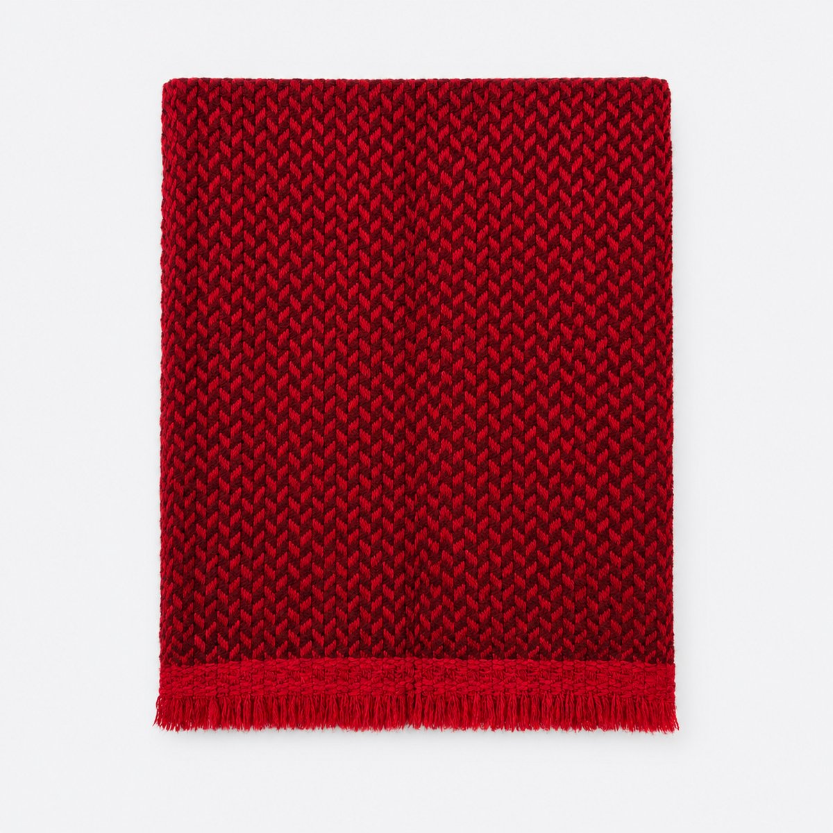 Crimson Chevron Cashmere Scarf editorial on sculptural lounge chair