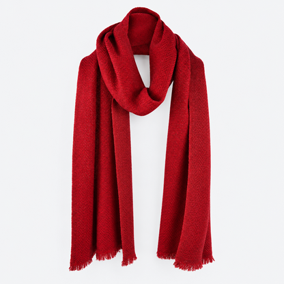 Crimson scarf hanging with fringed ends