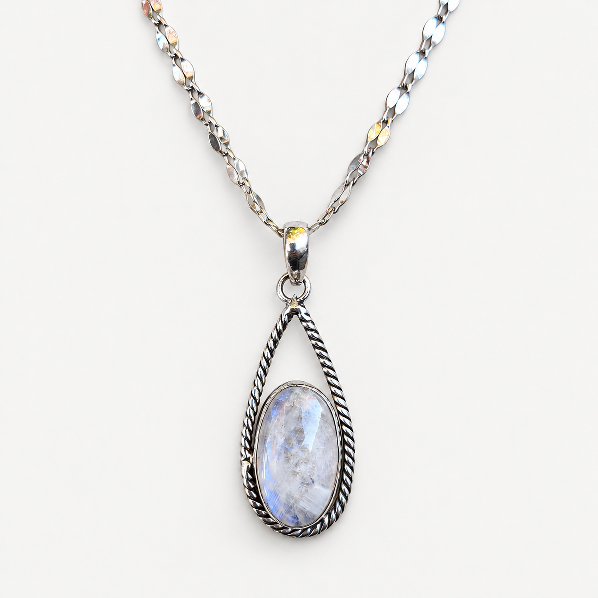 Moonstone teardrop pendant and chain product photograph