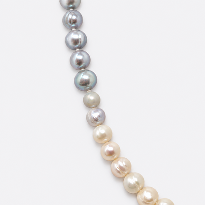 Close-up of silver and cream pearls
