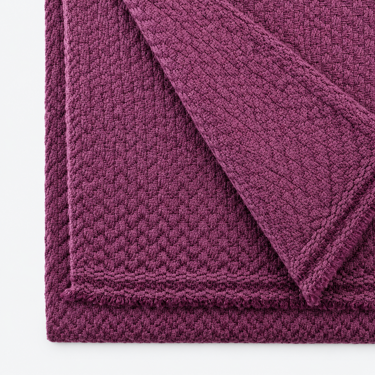 Closeup of plum cashmere scarf woven texture