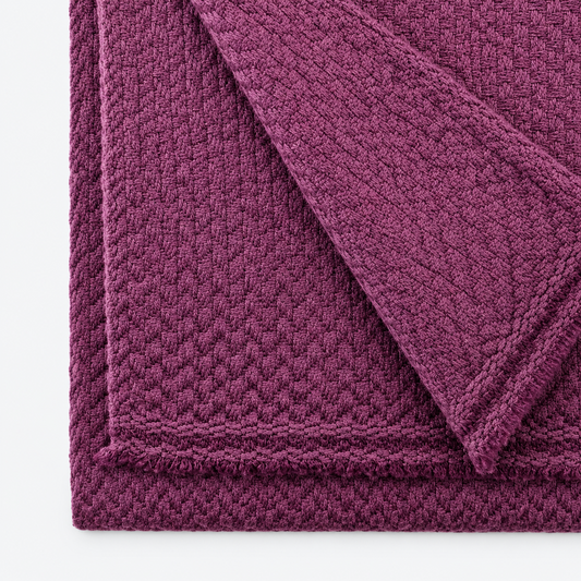 Closeup of plum cashmere scarf woven texture
