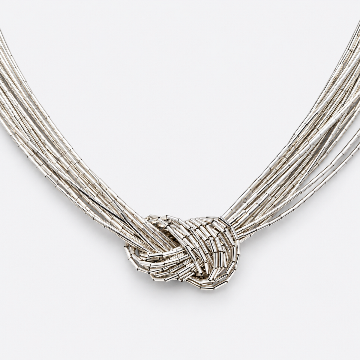 Detail of silver multi-strand knotted centerpiece