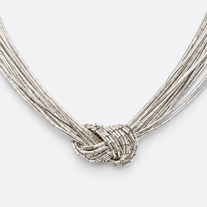 Detail of silver multi-strand knotted centerpiece