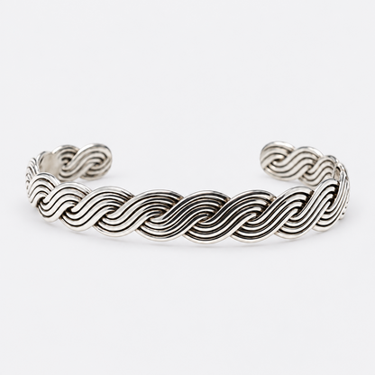Woven Cuff Bracelet sculptural wave pattern studio view